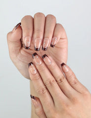 Close-up of Naillover Bare Crystal nails — transparent and amber color blend with shimmering stones, a classic nail look handmade in Singapore.