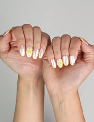 Naillover Bloom Whimsy Singapore press on nails styled with a summer outfit, highlighting 3D floral charm.