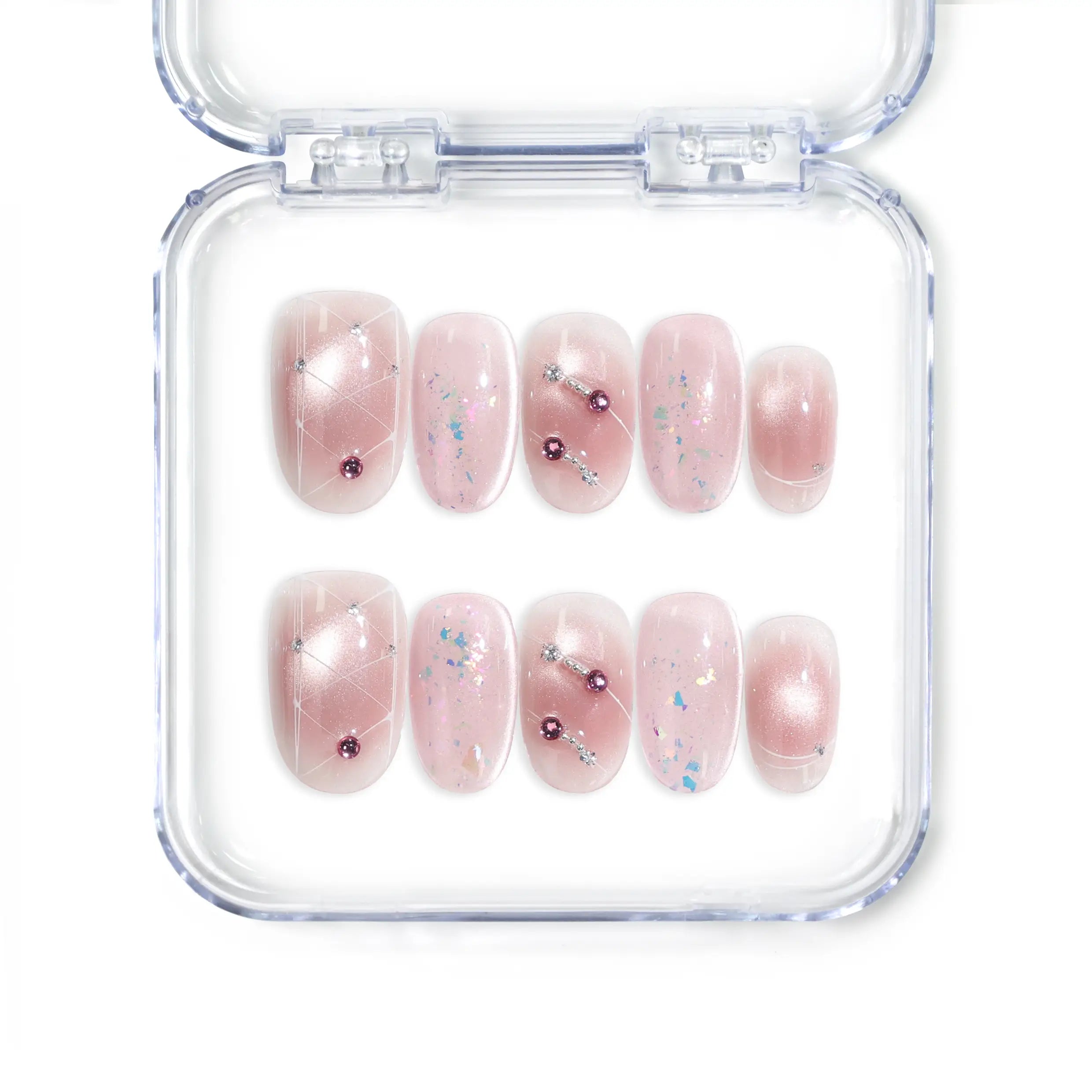 Handmade Singapore press on nails in blush pink with gold and silver glitter accents by Naillover.