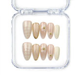 Naillover handmade press on nails in almond shape, featuring blush pink and coral gradient design with subtle lattice detail — summer-ready nails from Singapore.