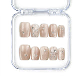 Naillover Chic Shimmer Singapore press on nails with nude base and shimmering gradient, handmade press on nails for a trendy yet classic look