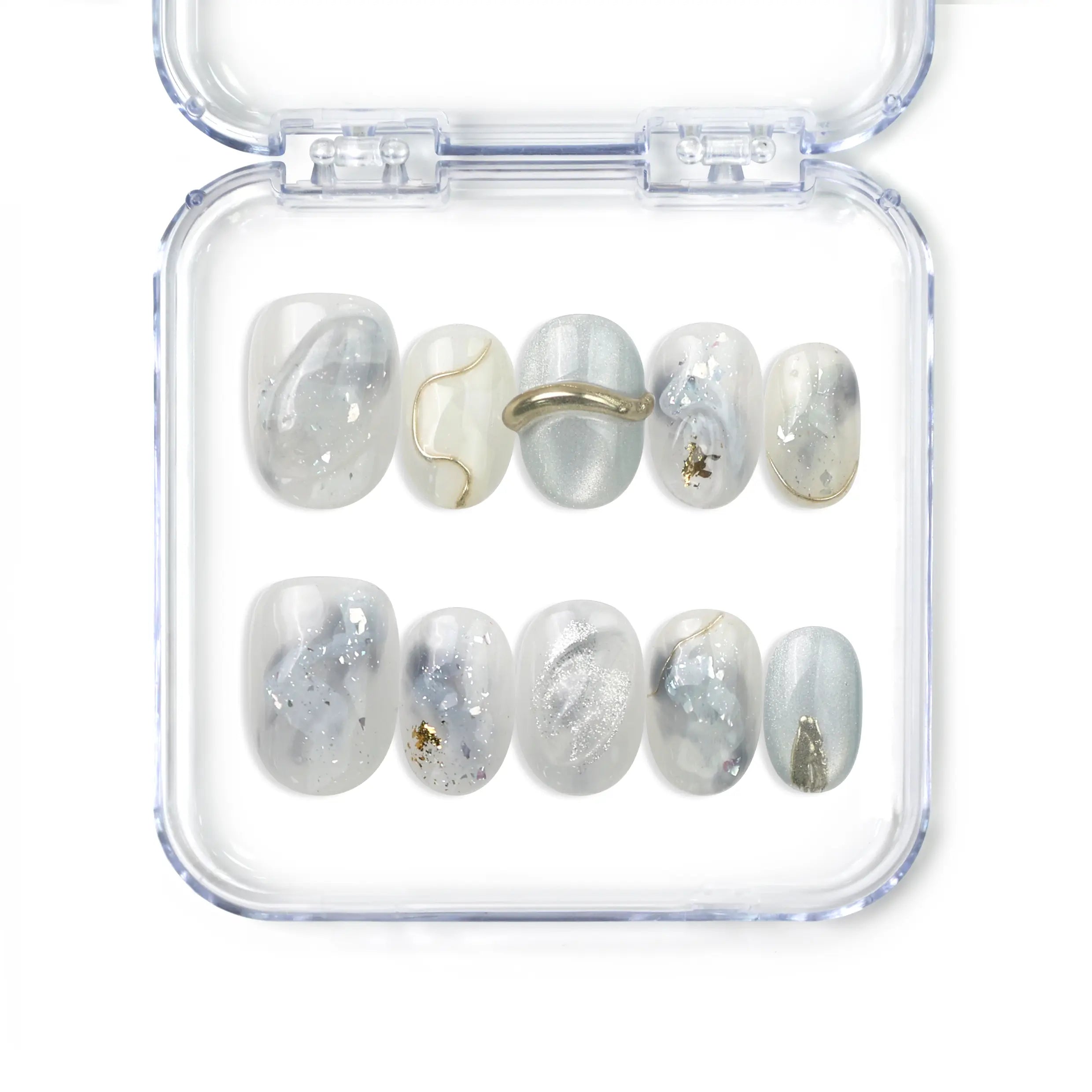 Naillover handmade press on nails with marble white and grey finish and gold accents from the Singapore press on nails collection.