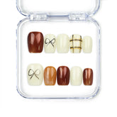 Cocoa Grid handmade press on nails by Naillover in creamy white and brown tones with bow and geometric design, classic and trendy nails style.