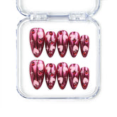 Cupid's Curve handmade Singapore press on nails by naillover featuring vibrant magenta base, heart patterns, and sparkling rhinestone accents for a romantic look