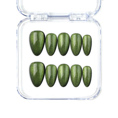 Short handmade press on nails in emerald green with cat eye effect by Naillover, Singapore.