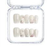 Full set of Naillover Flora Sheen Singapore press on nails featuring soft pink and white handmade floral gradient design with subtle 3D detail.