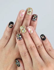 Wearing Naillover’s Gem Enchant short press on nails with black base and shimmering 3D details—perfect for trendy everyday glam.