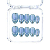 Short almond handmade press on nails in icy blue with a soft cat eye effect by Naillover, Singapore.