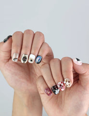 Naillover Midnight Whisper nails on hand—deep navy press on nails with silver 3D flower accents for classic chic.