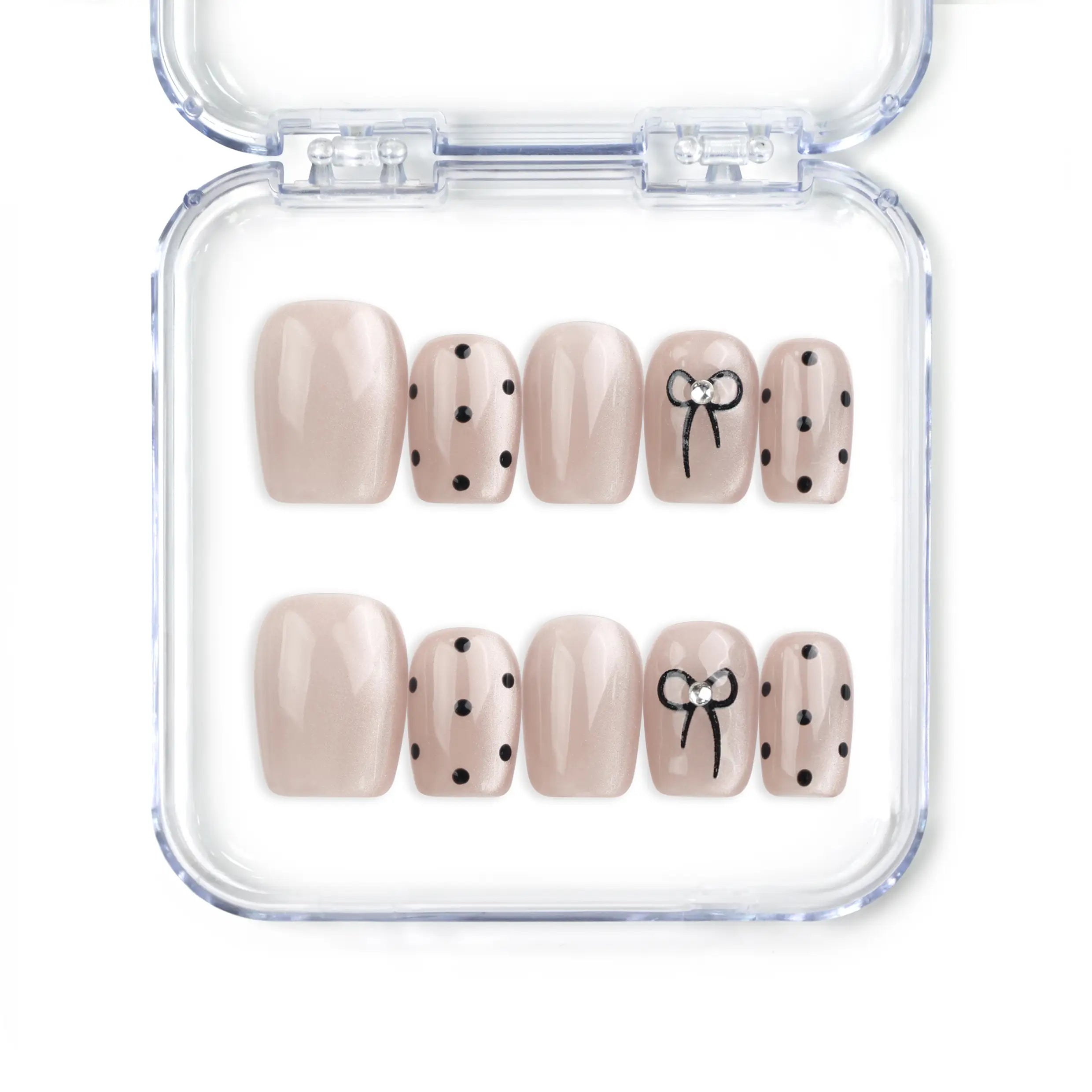 Naillover Mocha Dot Singapore press on nails in taupe with polka dots and bows, handmade cute nails design on white background