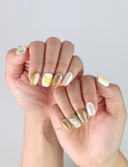 Close-up of Naillover Singapore press on nails in Nature's Glow, combining coquette-style charm with nature-inspired design.