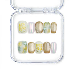 Full set of Naillover Nature's Glow Singapore press on nails featuring handmade floral designs with gold foil accents and a soft natural finish.