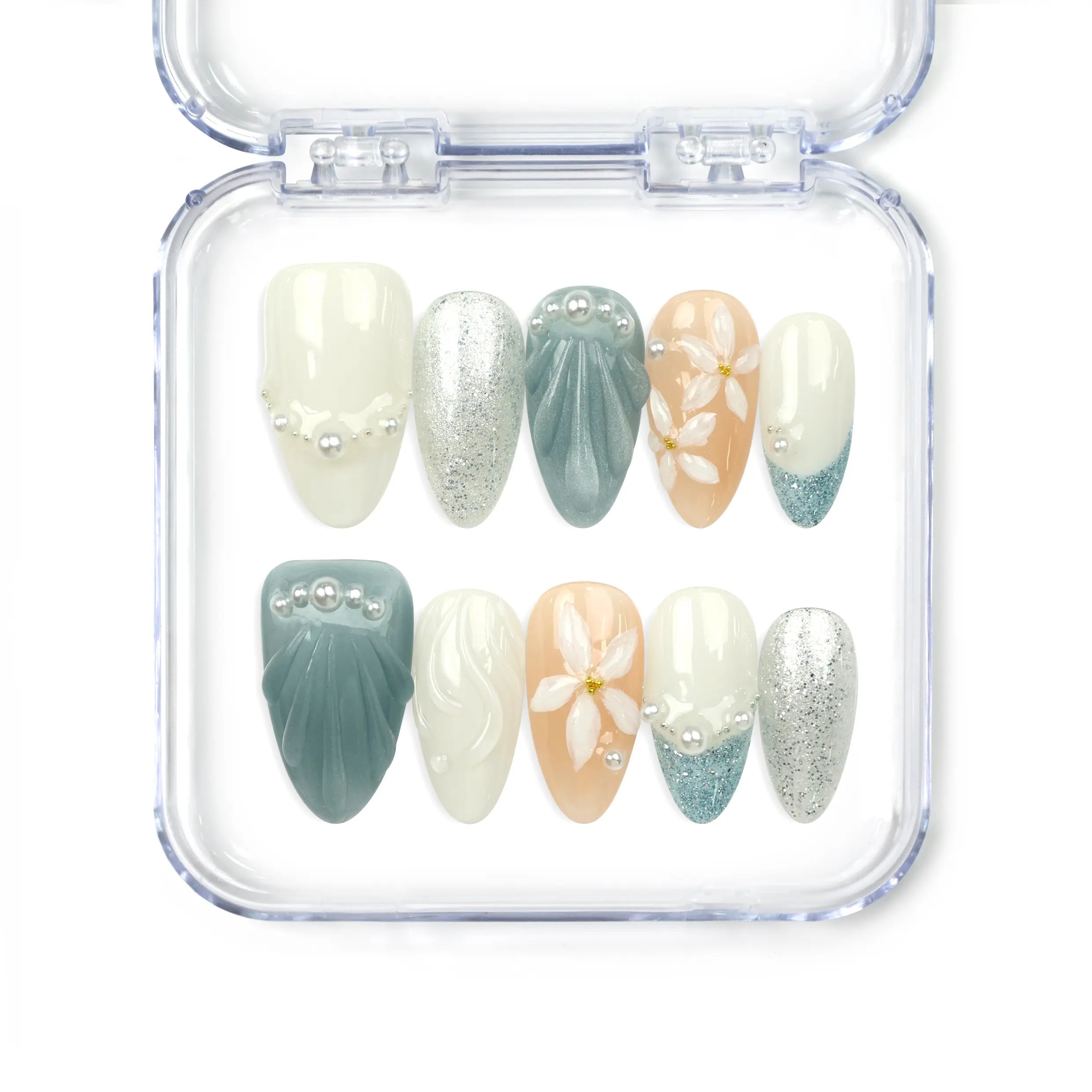Naillover Oceanic Floral Breeze handmade press on nails with blue-green and beige tones, floral art, shell textures, glitter, and pearl accents — elegant Singapore press on nails.