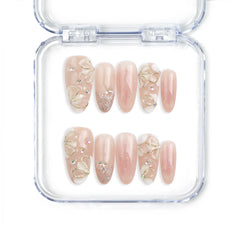 Naillover Peachy Glow Singapore press on nails with soft pink floral accents and a glossy handmade finish.