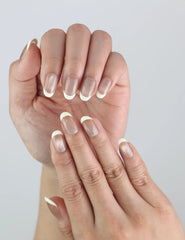 Close-up of Pearl Glow nails — subtle sheen on a soft nude base, part of Naillover's classic handmade press on collection.