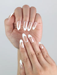 Naillover Pearly Shine Singapore press on nails worn by model — clean white nails with glossy, pearly finish.