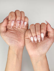 Naillover Pink Brown Star Diamond Butterfly Dream trendy nails styled on hands, highlighting coquette nails elegance and glitter finish
