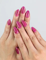 Wearing Purple Pulse handmade purple cat eye press on nails by Naillover Singapore.