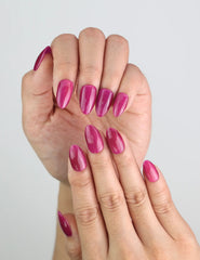 Close-up of Purple Pulse purple shimmer cat eye press on nails, Naillover SG collection.