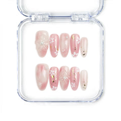 Naillover Sakura Singapore press on nails featuring soft pink tones and raised 3D floral designs, handcrafted for a charming spring look.