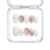 Full set of Naillover Sandy Shine Singapore press on nails featuring a peach and white color blend, handmade speckle details, and soft gold embellishments.