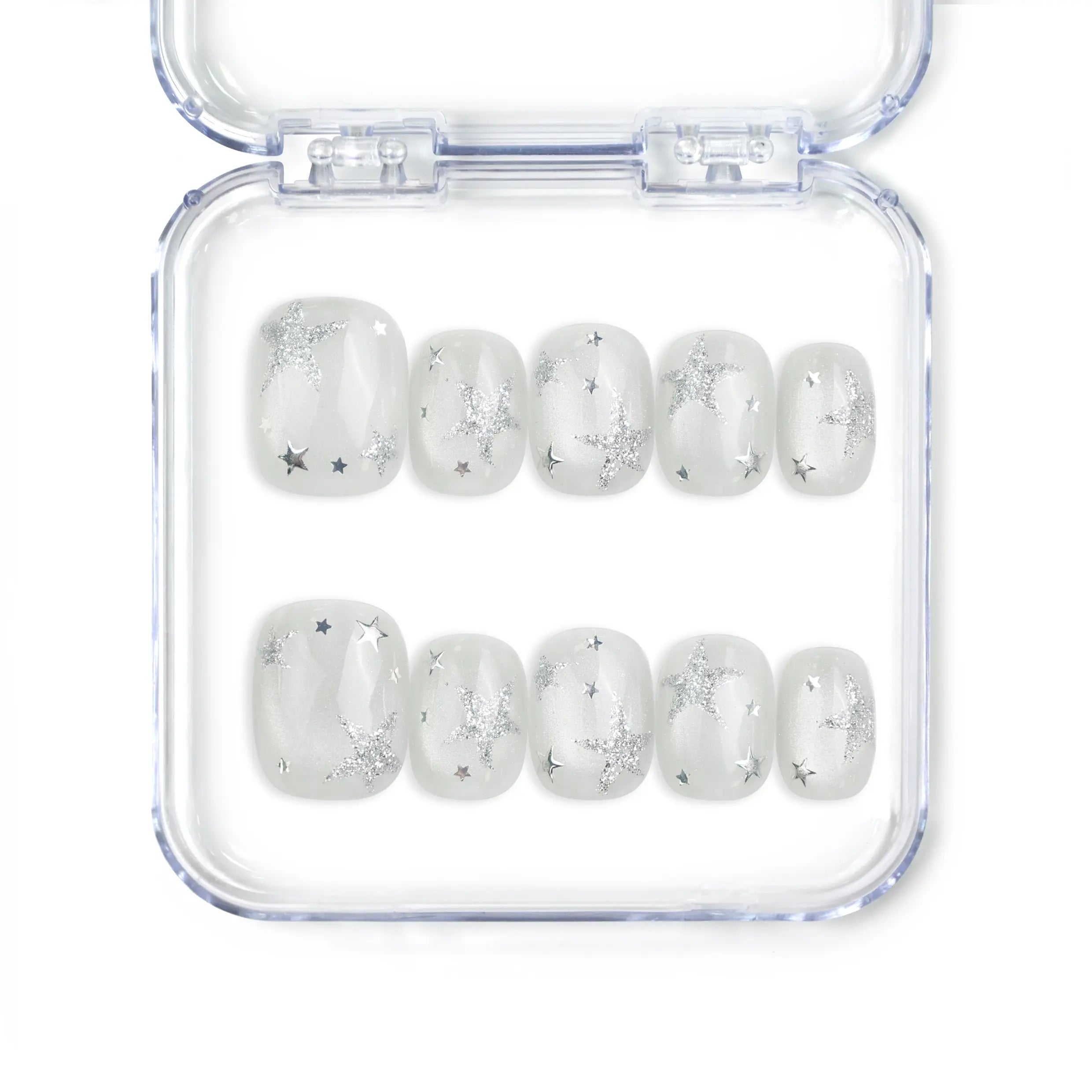 Naillover Silver Skies handmade Singapore press on nails with white base and silver star designs, perfect for trendy glamorous looks.