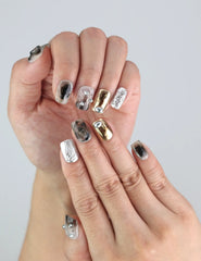 Close-up of sculpted chrome and marble accents on Naillover handmade press on nails — edgy Singapore design with Y2K nails inspiration.