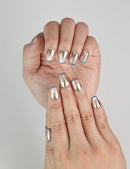 Close-up of Soft Luster handmade Singapore press on nails, pearlescent white matte finish with classic minimalist elegance