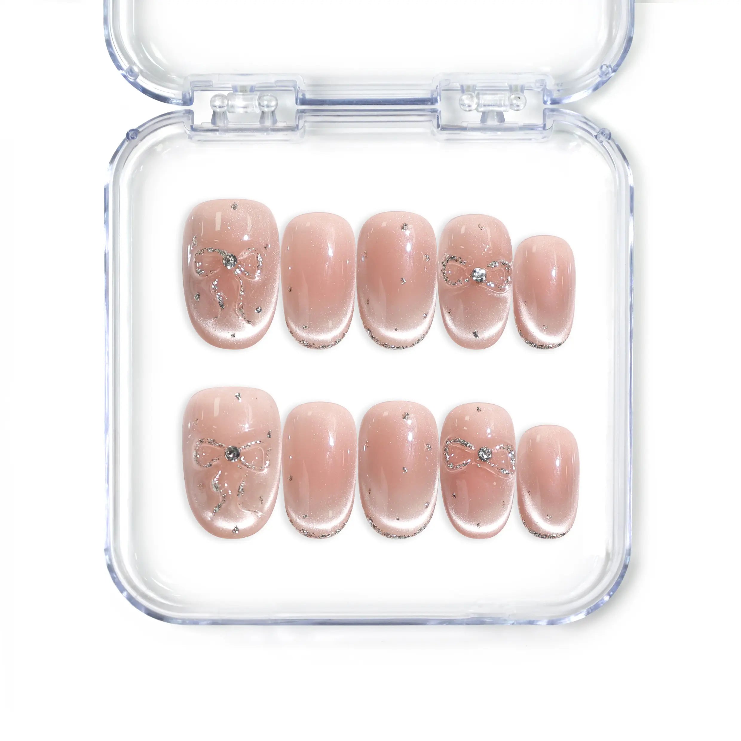 Handmade Singapore press on nails with gradient cat eye effect and silver bow accents by Naillover.