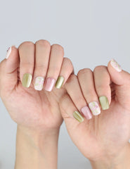 Naillover Spring Buds nails on hand—showcasing delicate handmade details and a fresh, trendy nail look for spring.