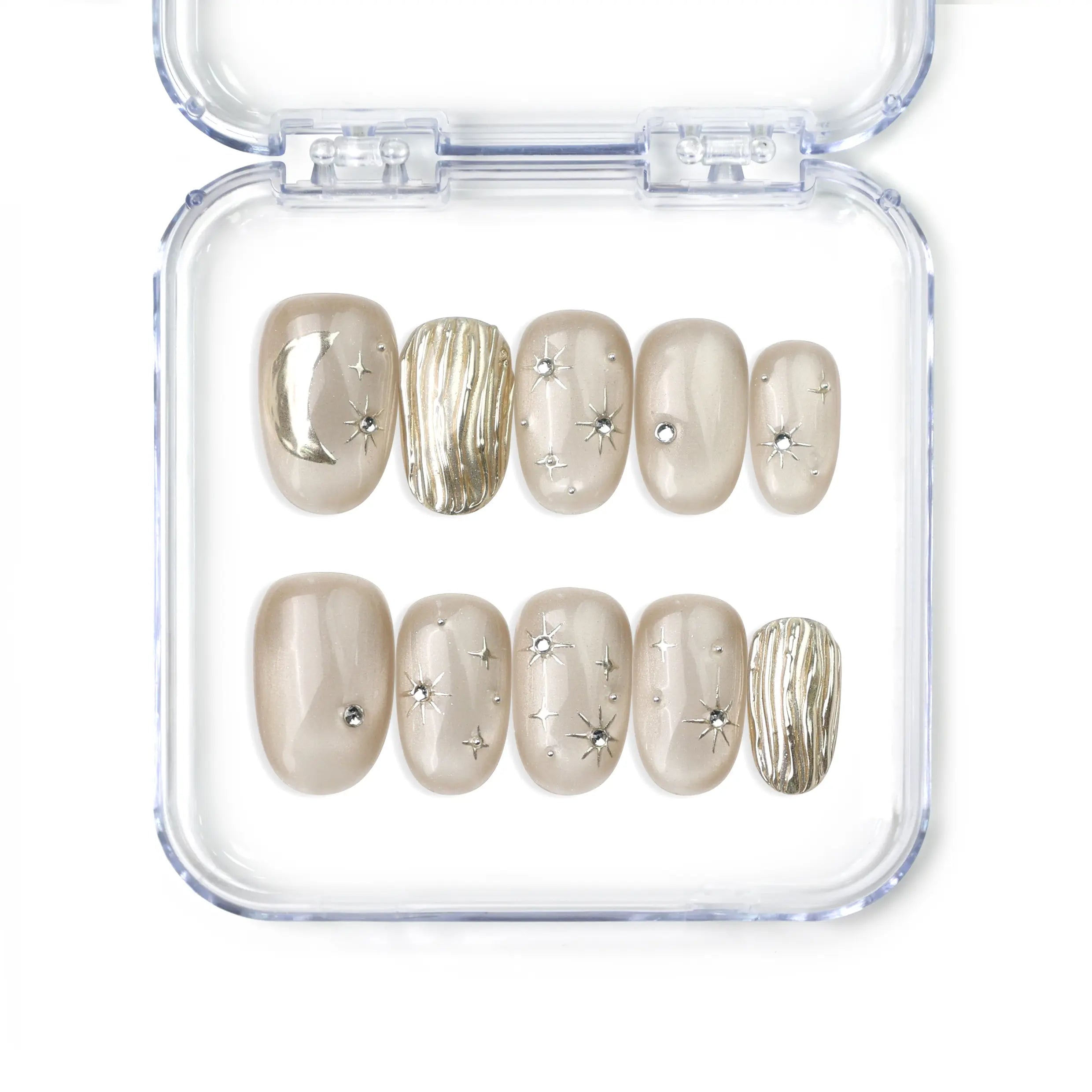 Naillover Starlet Shine handmade press on nails with champagne nude tones and fine gold thread detailing from the Singapore press on nails line.