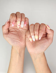 Naillover Sweet Pink Yellow 3D Floral Droplet trendy nails styled on hands, highlighting 3D summer nails charm