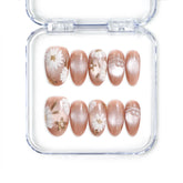 Handmade Singapore press on nails in earthy tangerine with white daisies and gold accents by Naillover.