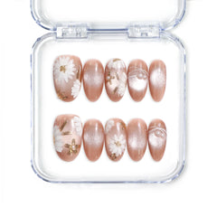 Handmade Singapore press on nails in earthy tangerine with white daisies and gold accents by Naillover.