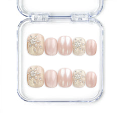 Warm Petal handmade Singapore press on nails by naillover featuring pink-to-white ombre and crystal rhinestone accents, elegant classic nail design