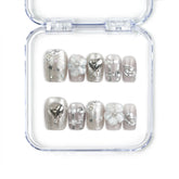 Nightfall handmade Singapore press on nails in metallic silver with rhinestones, elegant and trendy design by naillover.