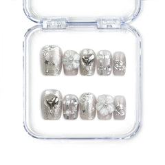 Nightfall handmade Singapore press on nails in metallic silver with rhinestones, elegant and trendy design by naillover.