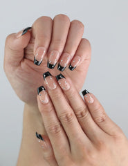 Model showing off coffin-shaped Nude Edge press on nails by Naillover, perfect for trendy everyday style.