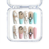 Coffin Singapore press on nails with pastel pink and blue tones, white crackle texture, and celestial accents by Naillover