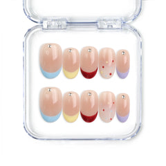 Rainbow Tips handmade press on nails by naillover, transparent base with colorful blue, yellow, and red glitter tips, Singapore press on nails for summer nails and cute looks.