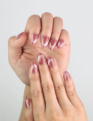 Close-up of Rosy French Glow handmade press on nails from Naillover, elegant pink cat eye finish.