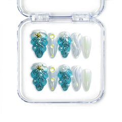 Handmade blue almond press on nails with 3D shell textures and gold starfish, from Singapore brand Naillover