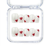 naillover Sparkle Love Singapore press on nails in white glitter with bold red heart accents, handmade press on nails set for a romantic coquette nails look.