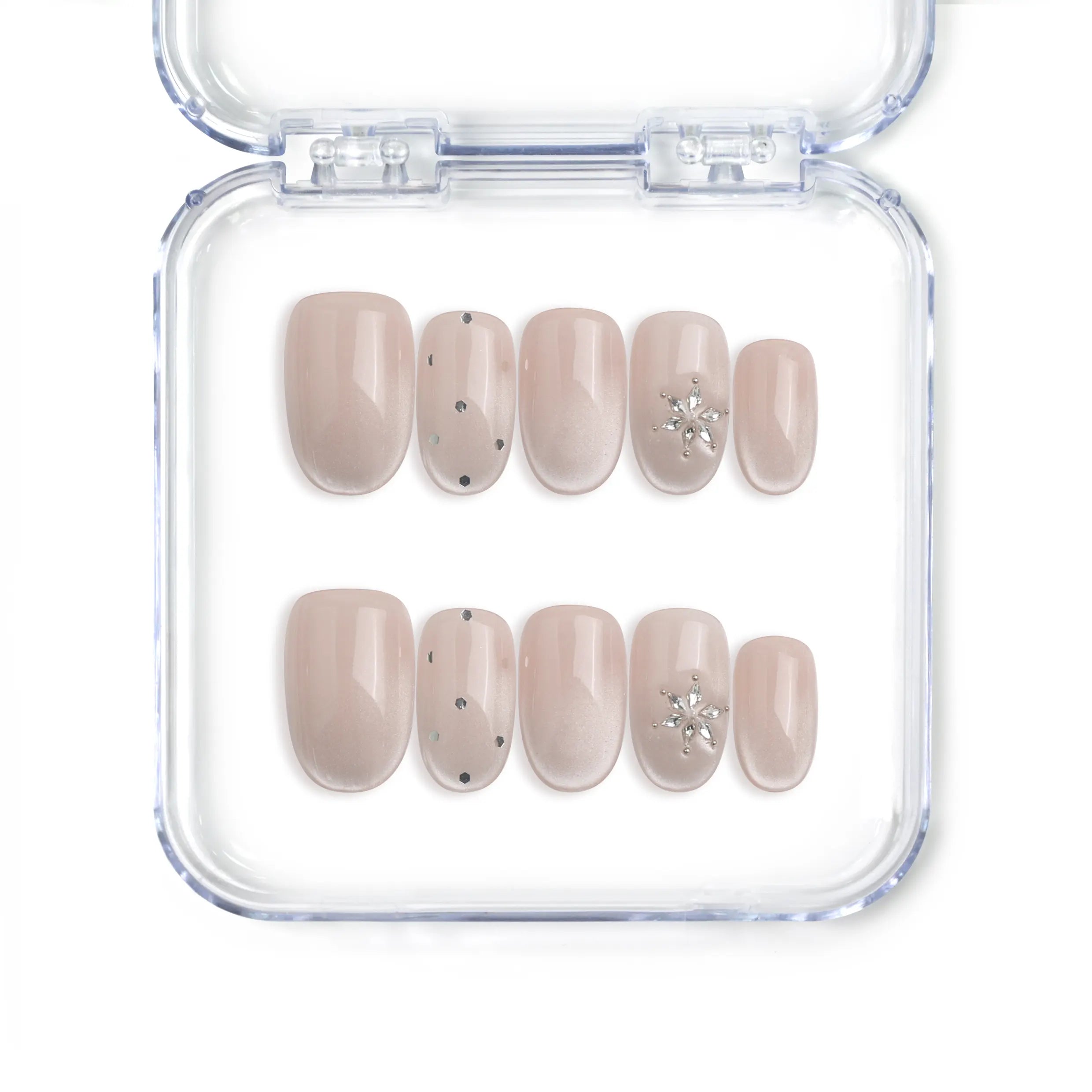 Handmade short oval press on nails in nude with crystal and glitter specks from Singapore brand Naillover