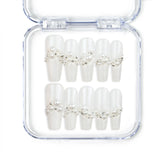 Starlight handmade Singapore press on nails with white base and silver star embellishments by naillover