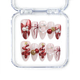 Xmas Sparkle red and white handmade press-on nails with festive bow accents, Singapore press on nails by naillover