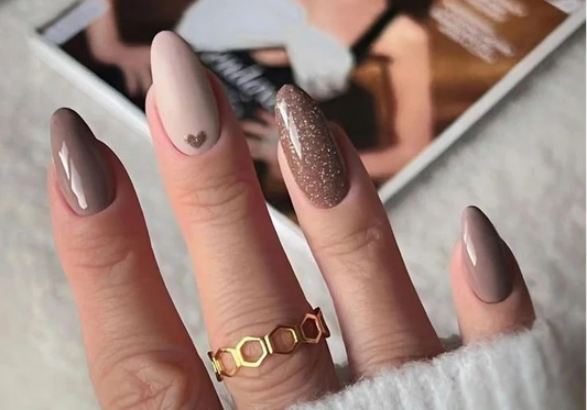 Classic press-on nails Singapore in nude, pink, and shimmer designs from Naillover, styled for work, evenings, and festive occasions.