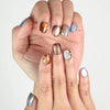 Amber Glow Singapore press on nails close-up, elegant autumn-inspired amber gradient design