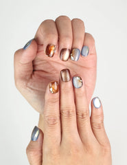 Amber Glow Singapore press on nails close-up, elegant autumn-inspired amber gradient design