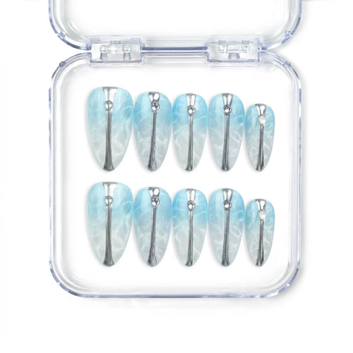 Aqua Wave Singapore press on nails with translucent base, wave patterns, and shimmering details, handmade by naillover for a trendy summer look